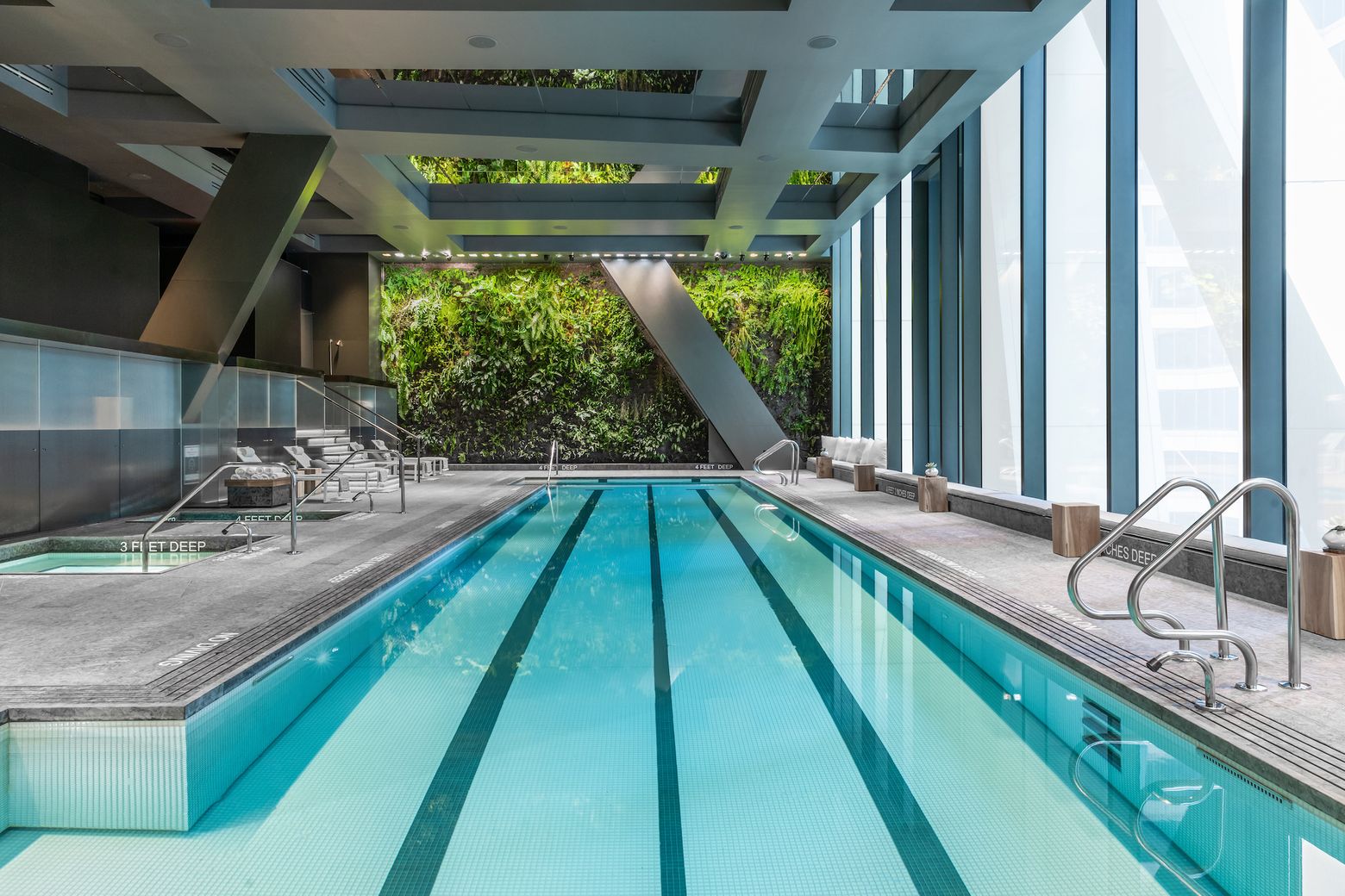 65-foot lap pool ringed by vertical gardens